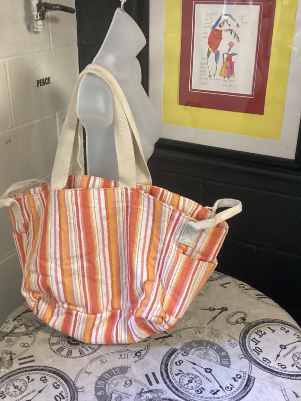 Universal thread oversized striped carpet bag.
